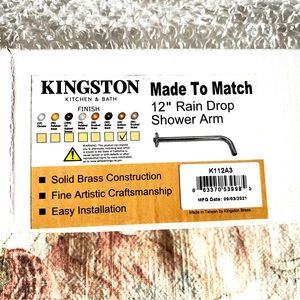 Kingston Brass 12” Raindrop Shower Arm in Antique Brass.